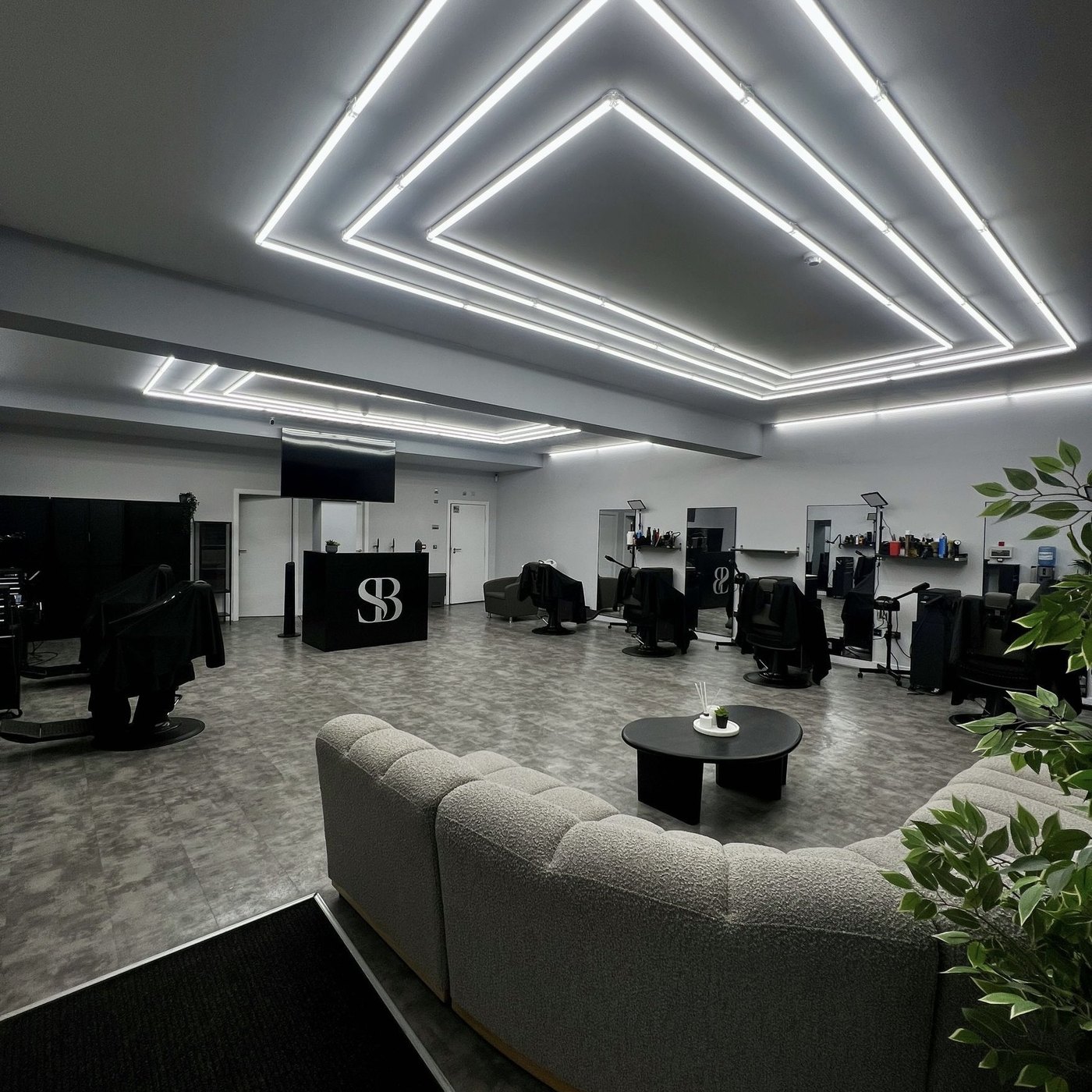 Inside Seidi's Barbershop — luxury interior with signature ceiling lighting